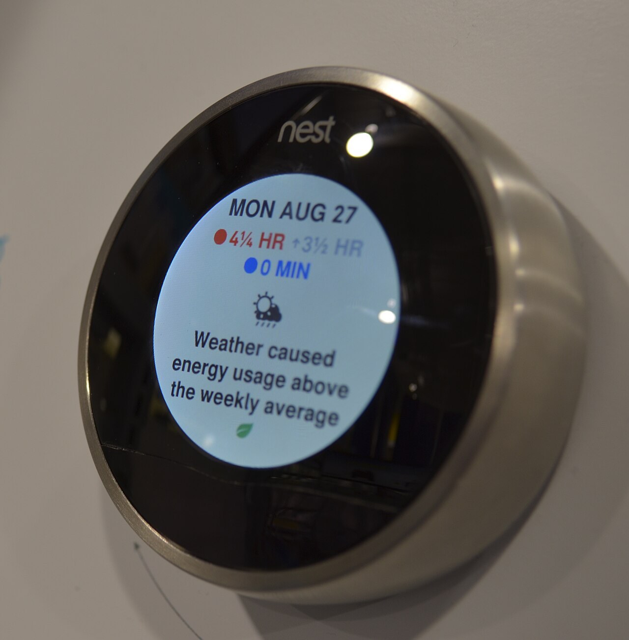 Residential Nest thermostat on a home wall